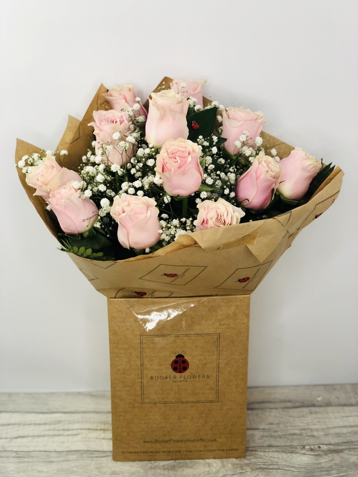 <h2>Dozen Pink Roses - Hand Delivered</h2>
<br>
<ul>
<li>Approximate Dimensions: 55cm x 35cm</li>
<li>Flowers arranged by hand and gift wrapped in our signature eco-friendly packaging and finished off with a hidden wooden ladybird</li>
<li>To give you the best occasionally we may make substitutes</li>
<li>Our flowers backed by our 7 days freshness guarantee</li>
<li>For delivery area coverage see below</li>
</ul>
<br>
<h2>Flower Delivery Coverage</h2>
<p>Our shop delivers flowers to the following Liverpool postcodes L1 L2 L3 L4 L5 L6 L7 L8 L11 L12 L13 L14 L15 L16 L17 L18 L19 L24 L25 L26 L27 L36 L70 If your order is for an area outside of these we can organise delivery for you through our network of florists. We will ask them to make as close as possible to the image but because of the difference in stock and sundry items it may not be exact.</p>
<br>
<h2>Hand-tied Bouquet | Flowers in box with water</h2>
<p>These beautiful flowers hand-arranged by our professional florists into a hand-tied bouquet are a delightful choice from our new Autumn collection. This bouquet of roses would make the perfect gift for any occasion or to let someone know you are thinking of them.</p>
<br>
<p>Handtied bouquets are a lovely display of fresh flowers that have the wow factor. The advantage of having a bouquet made this way is that they are artfully arranged by our florists and tied so that they stay in the display.</p>
<br>
<p>They are then gift wrapped and aqua packed in a water bubble so that at no point are the flowers out of water. This means they look their very best on the day they arrive and continue to delight for days after.</p>
<br>
<p>Being delivered in a transporter box and in water means the recipient does not need to put the flowers in a vase straight away they can just put them down and enjoy.</p>
<br>
<p>Featuring 12 pink large-headed roses and gypsophila together with mixed seasonal foliages.</p>
<br>
<h2>Eco-Friendly Liverpool Florists</h2>
<p>As florists we feel very close earth and want to protect it. Plastic waste is a huge problem in the florist industry so we made the decision to make our packaging eco-friendly.</p>
<p>To achieve this we worked with our packaging supplier to remove the lamination off our boxes and wrap the tops in an Eco Flowerwrap which means it easily compostable or can be fully recycled.</p>
<p>Once you have finished enjoying your flowers from us they will go back into growing more flowers! Only a small amount of plastic is used as a water bubble and this is biodegradable.</p>
<p>Even the sachet of flower food included with your bouquet is compostable.</p>
<p>All our bouquets have small wooden ladybird hidden amongst them so do not forget to spot the ladybird and post a picture on our social media pages to enter our rolling competition.</p>
<br>
<h2>Flowers Guaranteed for 7 Days</h2>
<p>Our 7-day freshness guarantee should give you confidence that we will only send out good quality flowers.</p>
<p>Leave it in our hands we will create a marvellous bouquet which will not only look good on arrival but will continue to delight as the flowers bloom.</p>
<br>
<h2>Liverpool Flower Delivery</h2>
<p>We are open 7 days a week and offer advanced booking flower delivery same-day flower delivery 3-hour flower delivery. Guaranteed AM PM or Evening Flower Delivery and also offer Sunday Flower Delivery.</p>
<p>Our florists deliver in Liverpool and can provide flowers for you in Liverpool Merseyside. And through our network of florists can organise flower deliveries for you nationwide.</p>
<br>
<h2>The Best Florist in Liverpool your local Liverpool Flower Shop</h2>
<p>Come to Booker Flowers and Gifts Liverpool for your beautiful flowers and plants. For that bit of extra luxury we also offer a lovely range of finishing touches such as wines champagne locally crafted Gin and Rum Vases Scented Candles and Chocolates that can be delivered with your flowers.</p>
<p>To see the full range see our extras section.</p>
<p>You can trust Booker Flowers and Gifts of delivery the very best for you.</p>
<p><br /><br /></p>
<p><em>5 Star review on Yell.com</em></p>
<br>
<p><em>Thank you Gemma for your fabulous service. The flowers are of the highest quality and delivered with a warm smile. My sister was delighted. Ordering was simple and the communications were top-notch. I will definitely use your services again.</em></p>